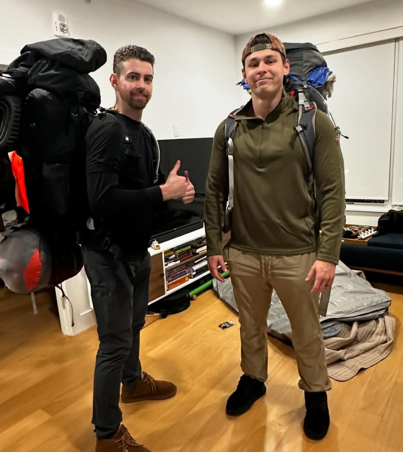 Patrick and a friend geared up for a backpacking trip